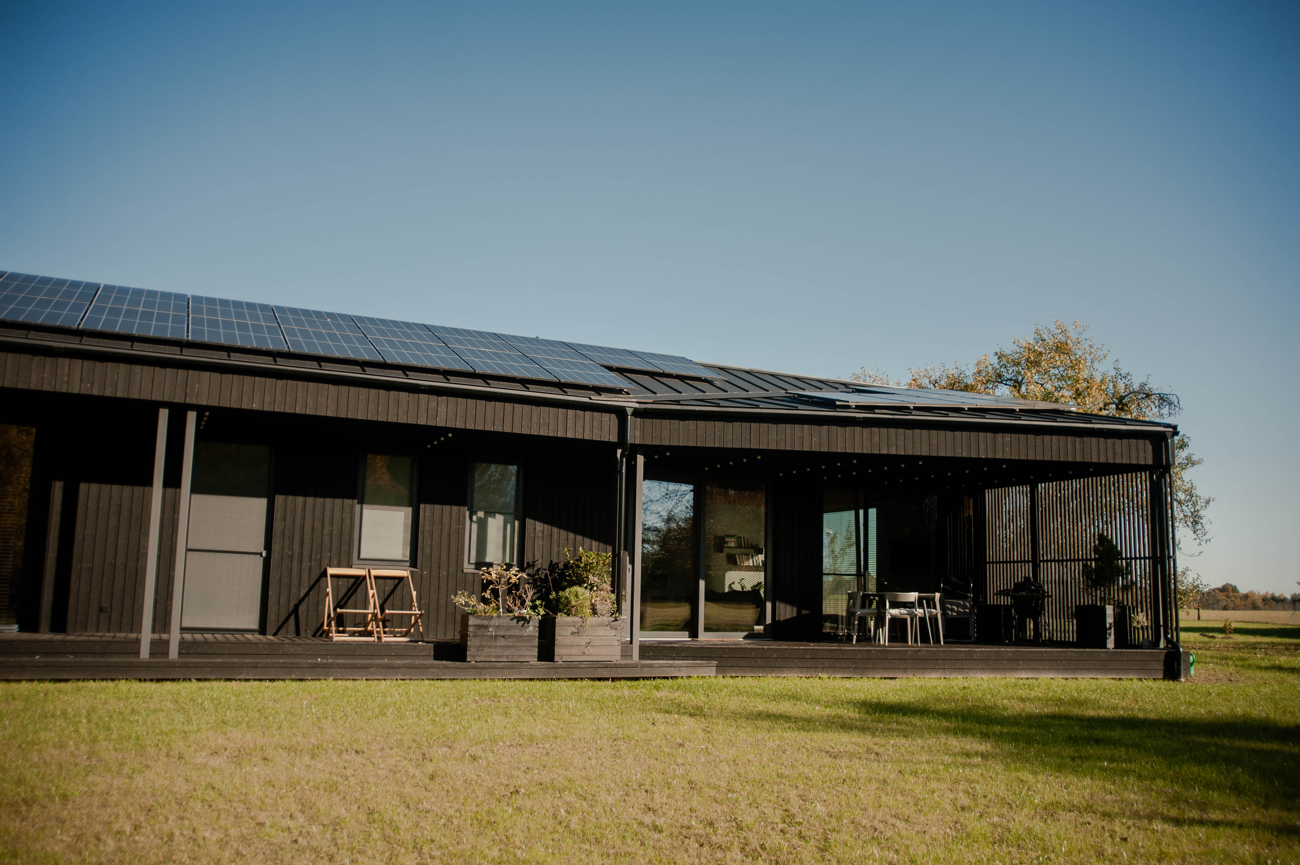 Nature Hideaway exterior with forest and pond